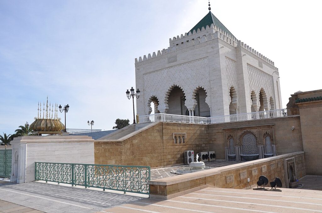 Exterior of Mausoleum of Mohammed V – Rabat – Morocco – Wikimedia Commons – by Jorge Lascar – 1200px-Mausoleum_of_Mohammed_V_Rabat_Morocco